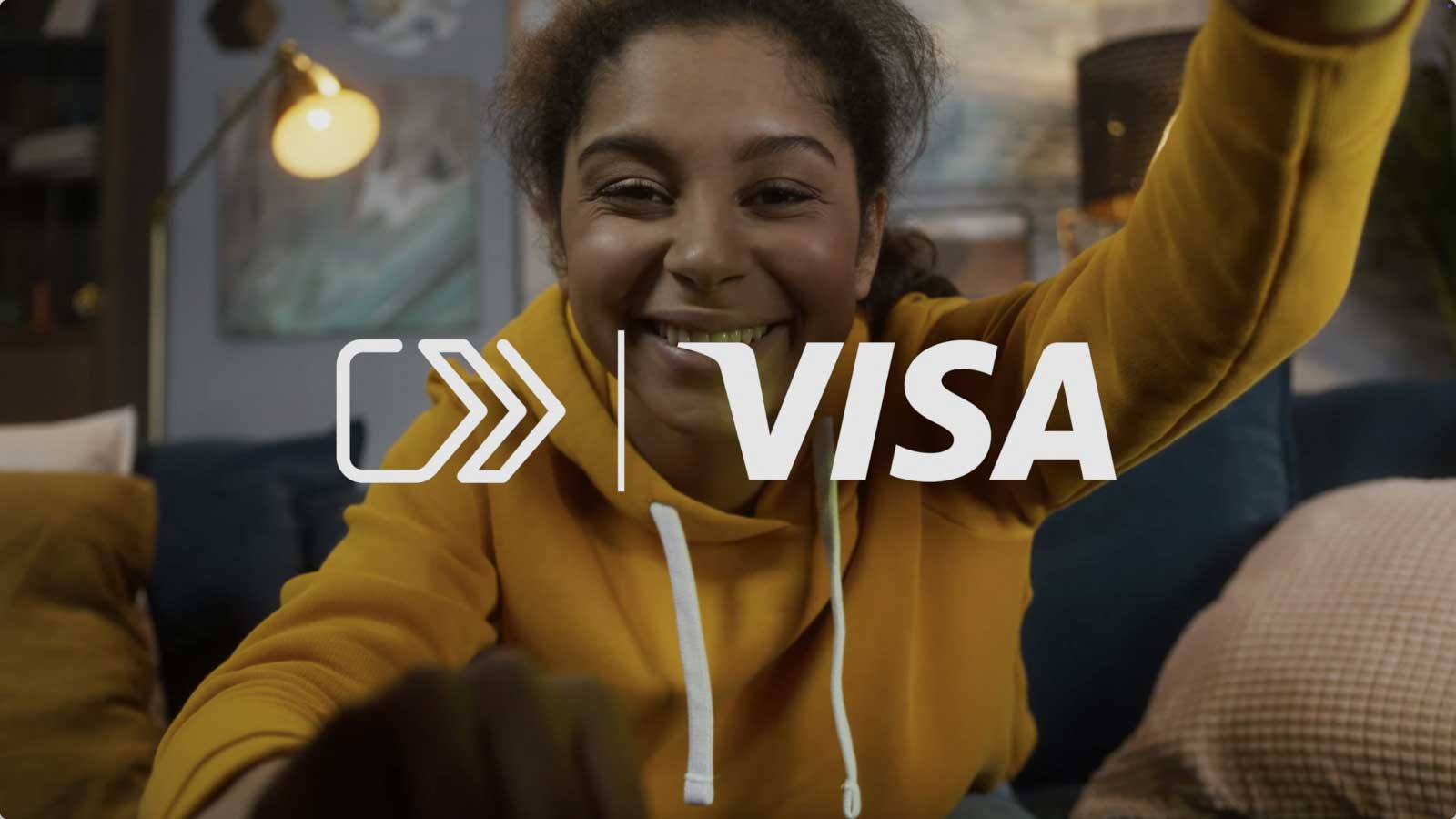 Click to Pay and Visa logos superimposed on image of girl wearing a sweatshirt.