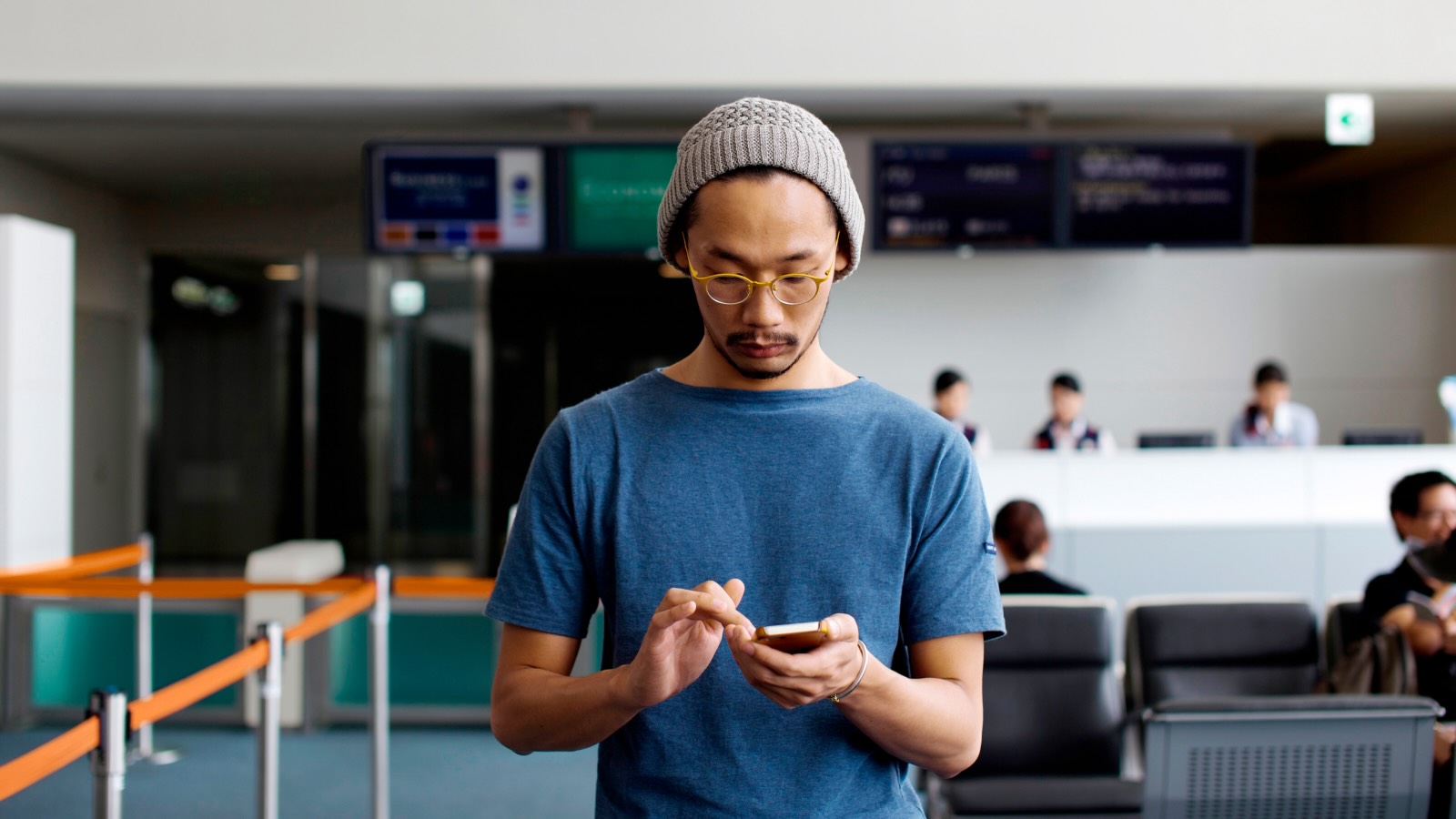 Person checking accounts on mobile device