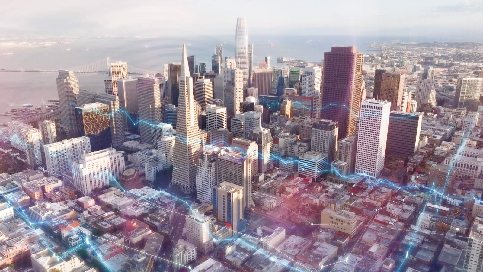 Cityscape with data flowing between buildings