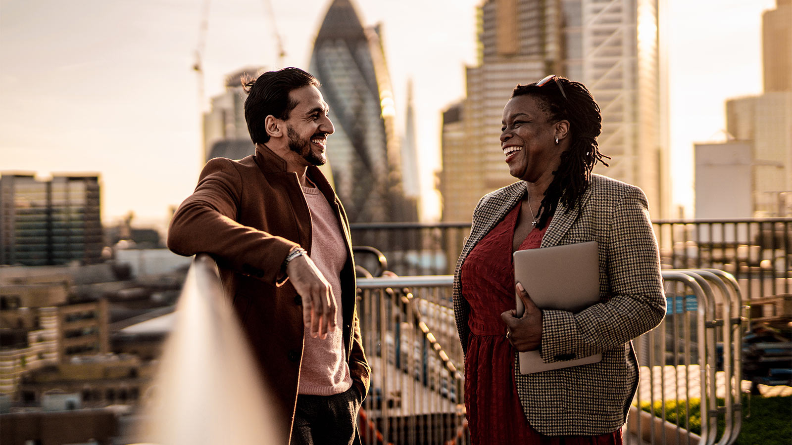 Two people smiling
