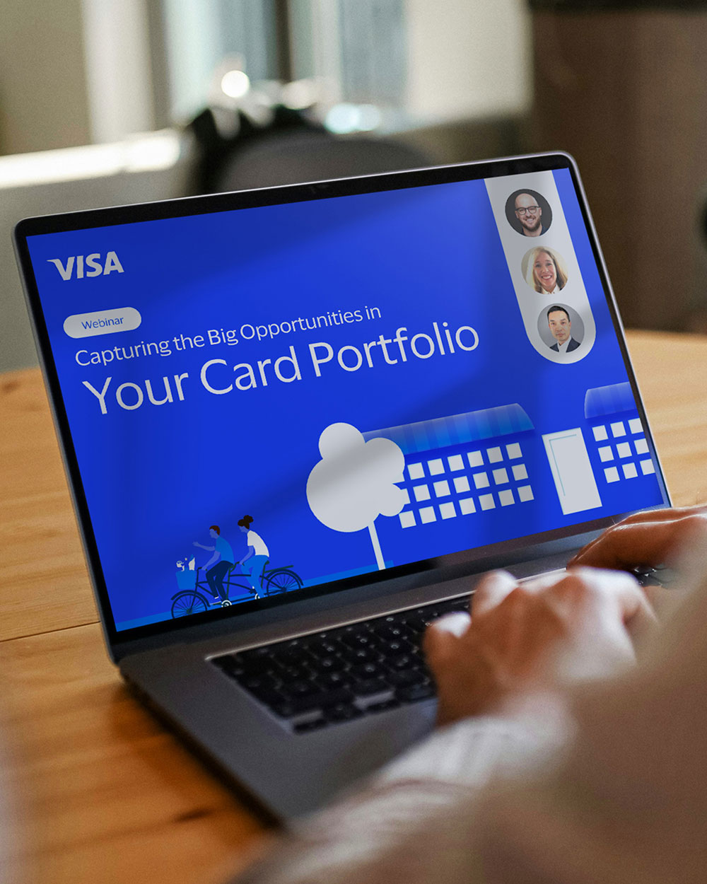 Capturing the Big Opportunities in Your Card Portfolio on laptop with Visa logo.
